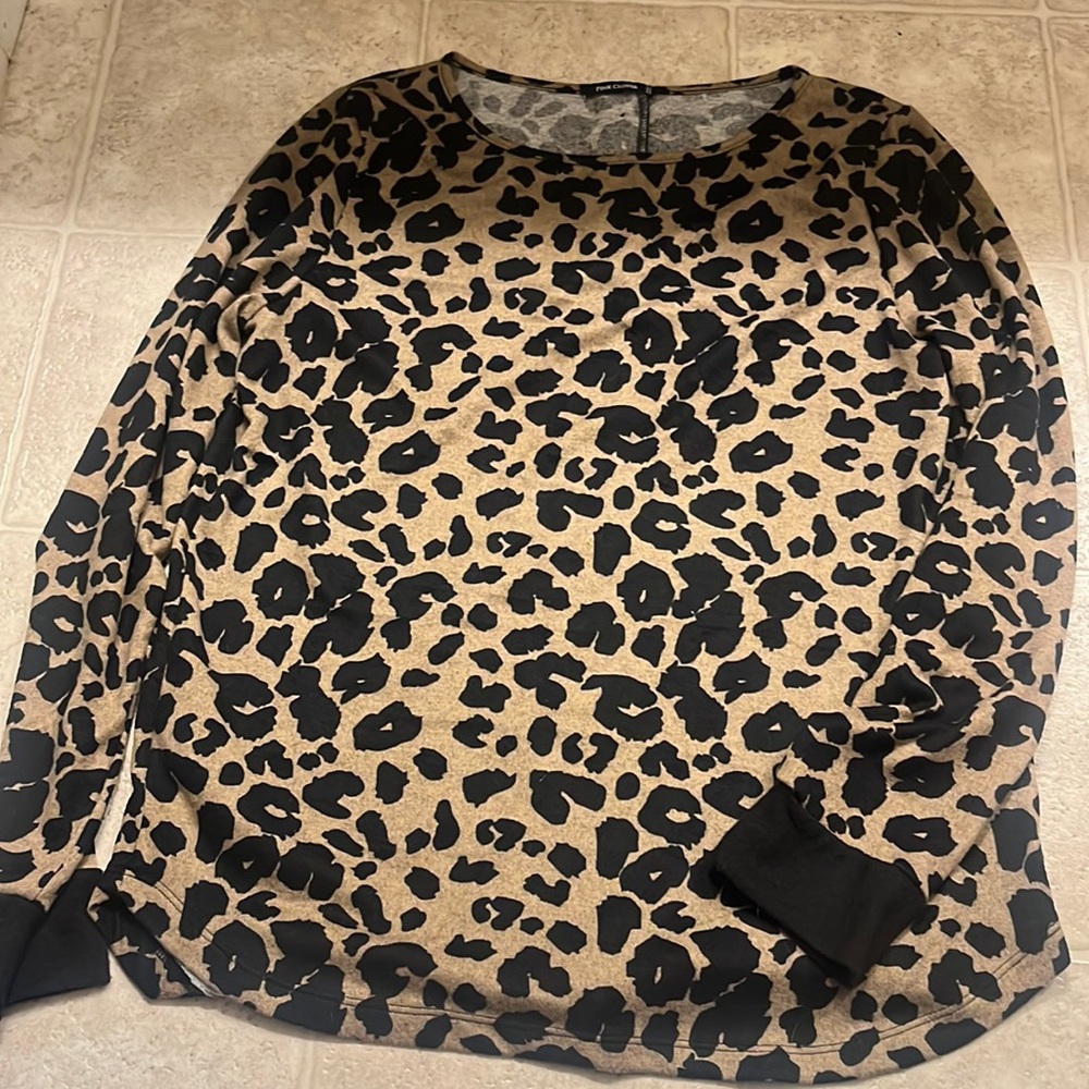 Worn once buttons in the back and elbow covers